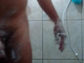 Gay amateur enjoys solo pleasure while trimming his pubic hair