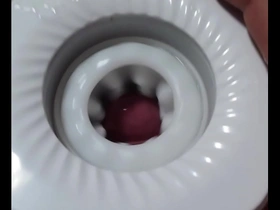 Gay Japanese man masturbates with a sex toy and has an orgasm.