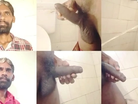 Two Indian men, Rajesh Playboy and 993, engage in a golden shower and ball rubbing scene.