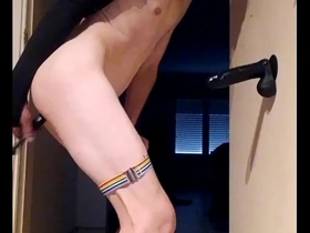 Playing with a dildo alone.