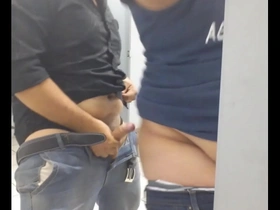 Gay bear has public toilet sex with a hunk.