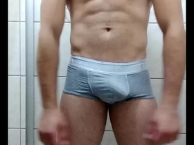 Steamy gay scene with a nice guy pleasuring himself until he reaches climax.