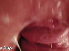 A hot creampie in a gay anal scene with a close-up view.