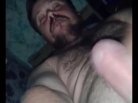 Gay masturbates with a big cock and gets a facial