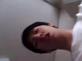 Young and straight Japanese boy goes solo in a steamy scene.