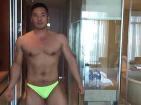 Tony, the Asian soloboy, showing off his muscles while he pleases himself.