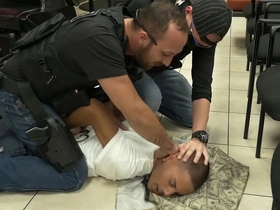 Gay officers from Five O raid a black man in a barbershop.