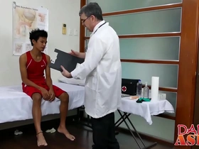 Skinny twink gets his ass spanked by a doctor with a hard cock.