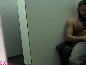 A hirsute man enjoys a Glory Hole experience with a young and straight man at the Boyberry Club Madrid.