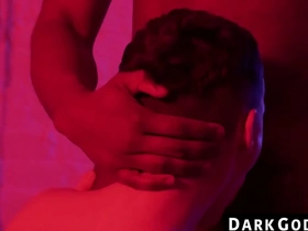 A black hunk dominates a small gay man in an interracial fuckfest on DarkGodz.com.