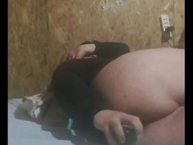 Skinny gay guy gets his ass fucked with a bottle in a gay video.
