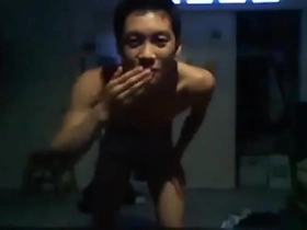 A solo performance of a small-framed, Asian cam boy masturbating and ejaculating.