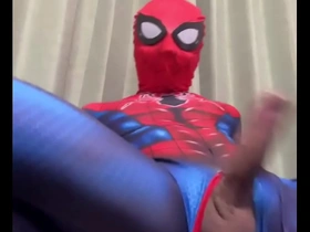Japanese hunk masturbates with his big cock like Spiderman