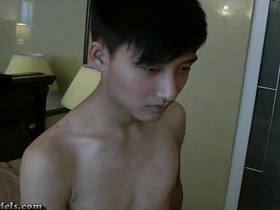 Gay Asian boys clean up after a hot session of masturbation with cum.